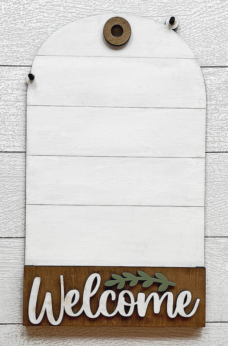 Interchangeable arch doorhanger